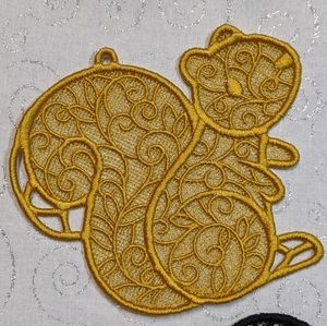 Lace embroidery critters. Hand them anywhere!